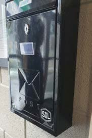 Image of a closed black box which contains a pouch opener